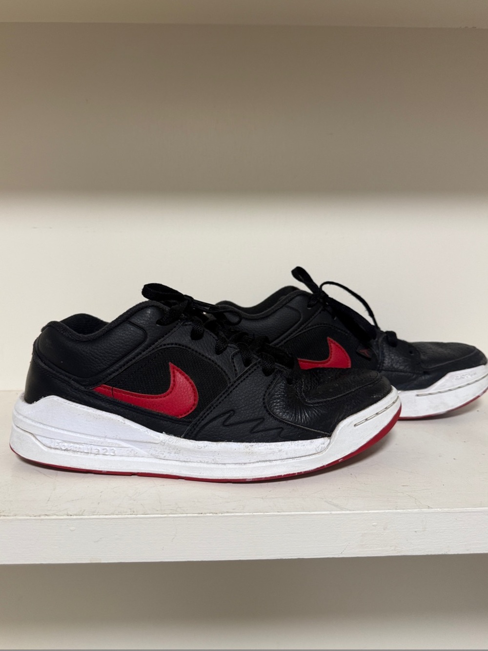 Nike Jordans Kids Black and Red Low-Top Sneakers